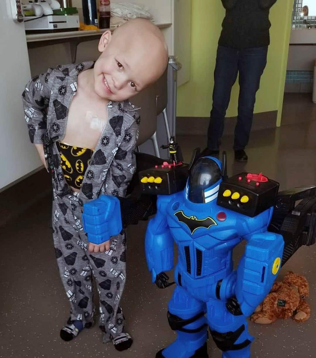 Garrett Matthias in hospital as he received treatment for a rare cancer.