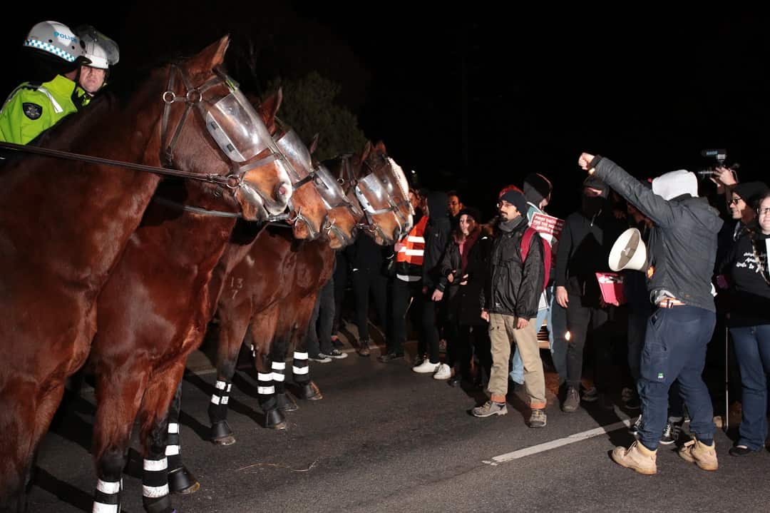 Anti-fascist protesters block the Hume highway.