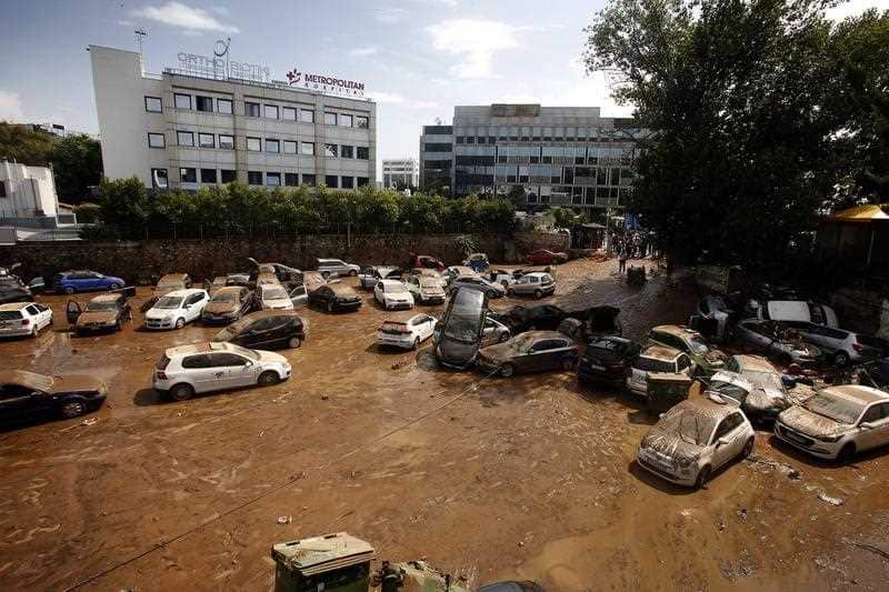 Piled up vehicles are seen at a street after a rainstorm in Maroussi, suburb of Athens, Greece, 26 July 2018.