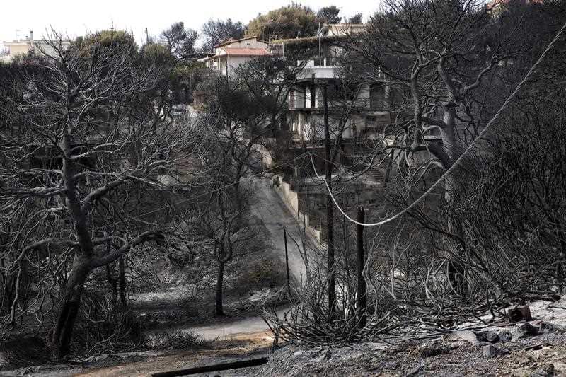 A fire damaged area with houses in Rafina, Attica, Greece, 26 July 2018, following a deadly forest fire.