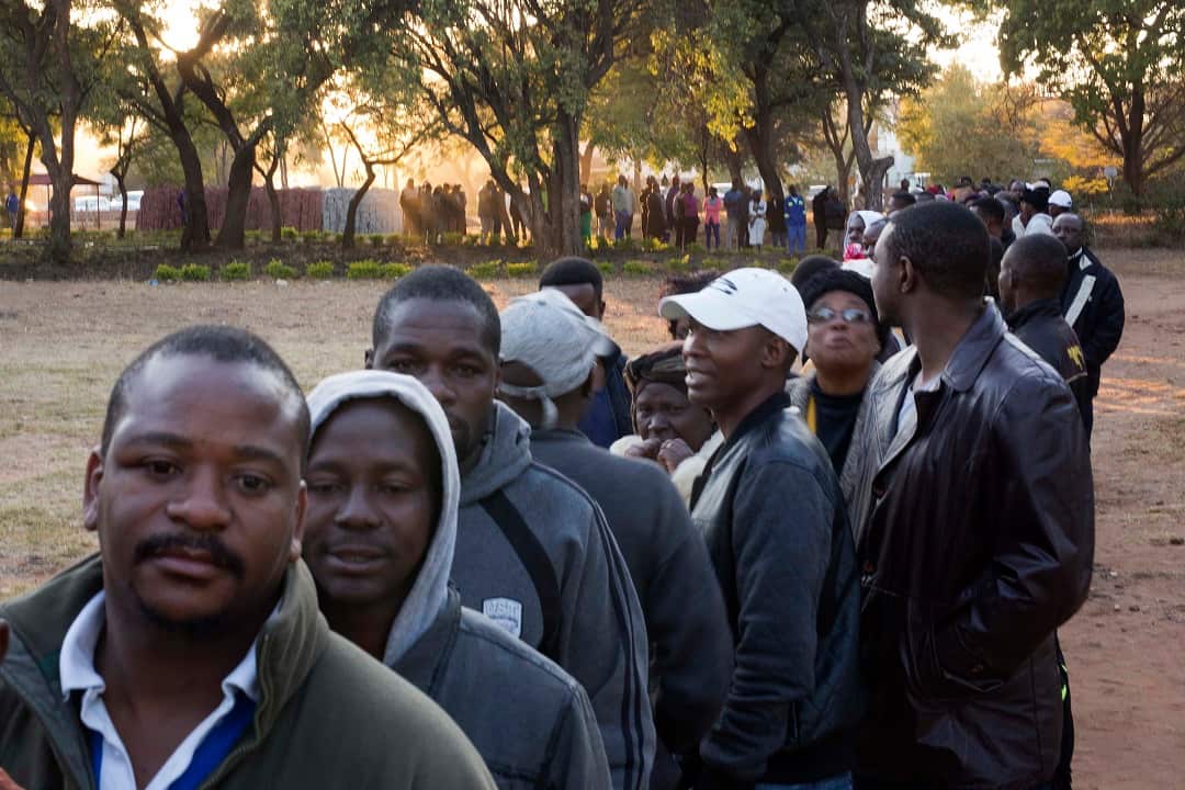 Zimbabweans line up to vote  at the Fitchela primary school in Kwekwe.