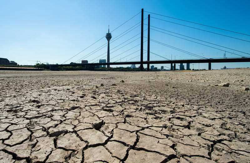 A general view of desiccation cracks on the banks of the Rhine river amid a heat wave in Duesseldorf, Germany, 07 August 2018.