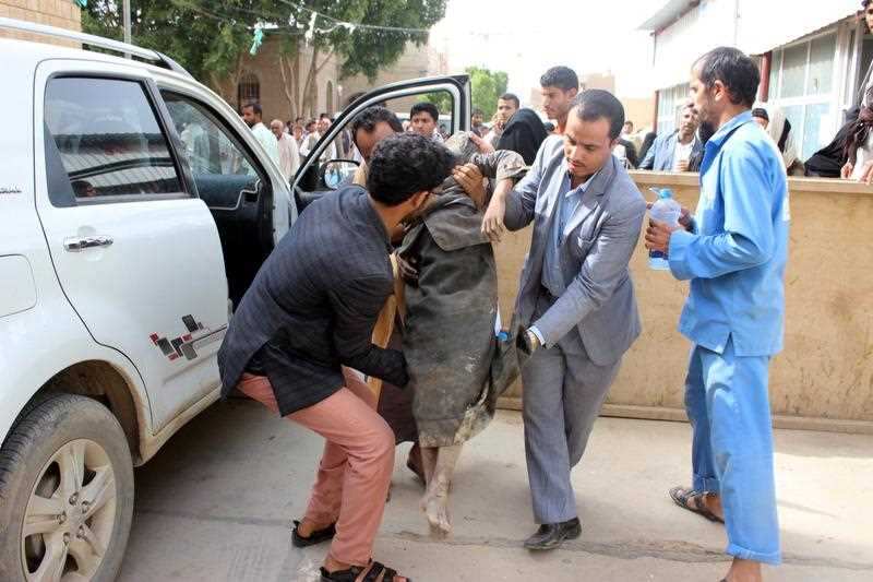 Yemenis helps a wounded child after being injured in an alleged Saudi-led airstrike, at a hospital in the northern province of Saada, Yemen, 09 August 2018.