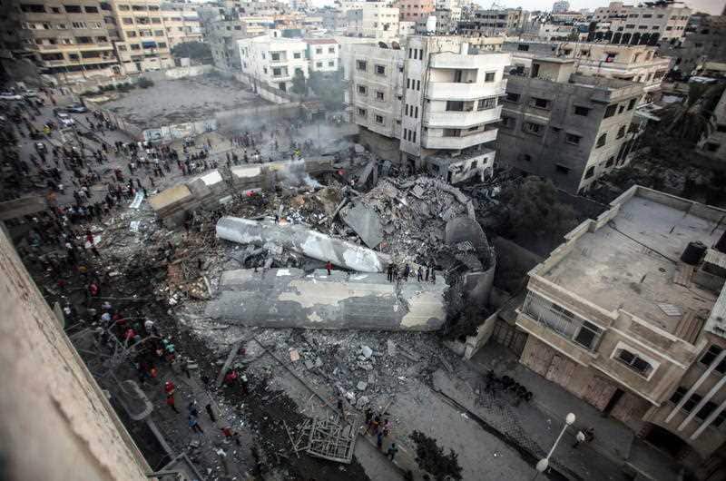 The Said al-Mishal Cultural Center building destroyed in this week's Israeli air strikes in the west of Gaza City.