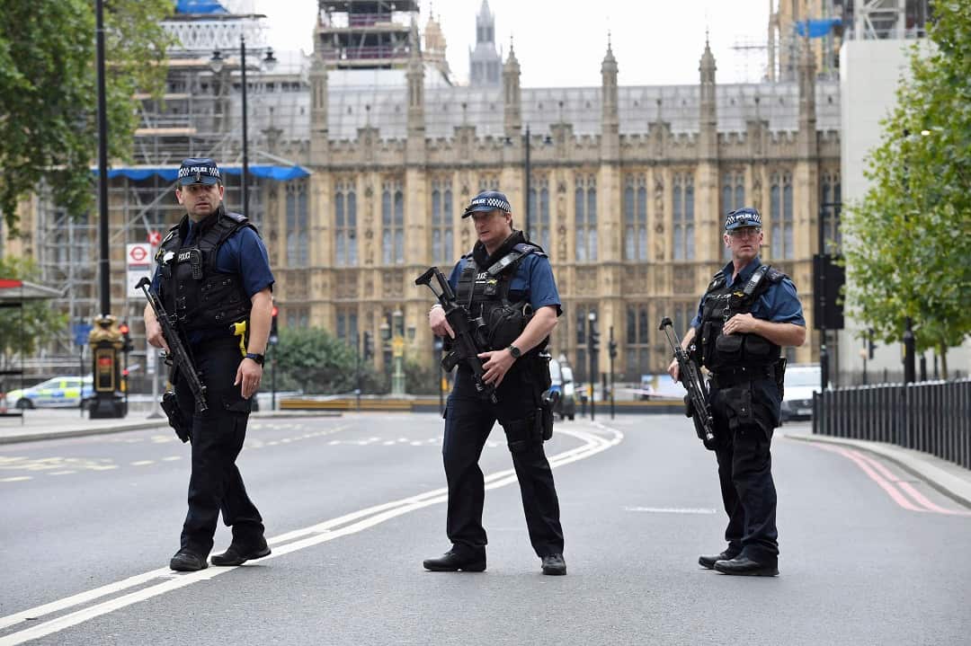 Armed police on Victoria Embankment in Westminster.