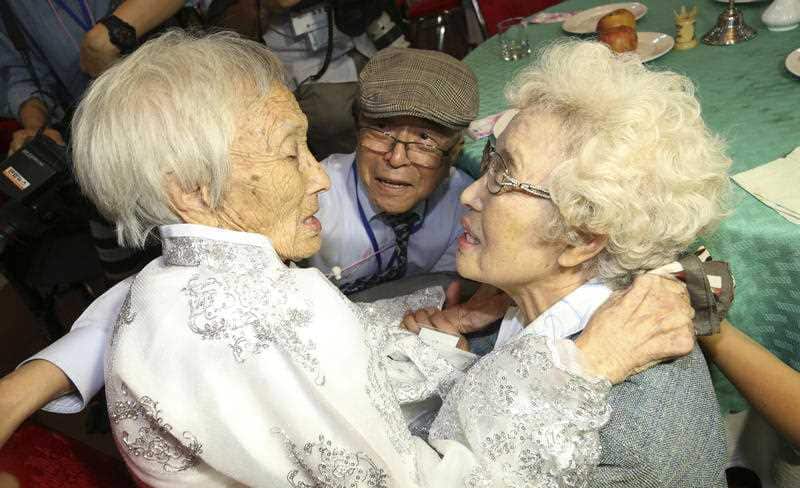    South Korean Cho Hye-do, 86, right, meets her North Korean sister Cho Sun Do, 89, left, during the Separated Family Reunion Meeting at the Diamond Mountain resort in North Korea, Monday, Aug. 20, 2018. 