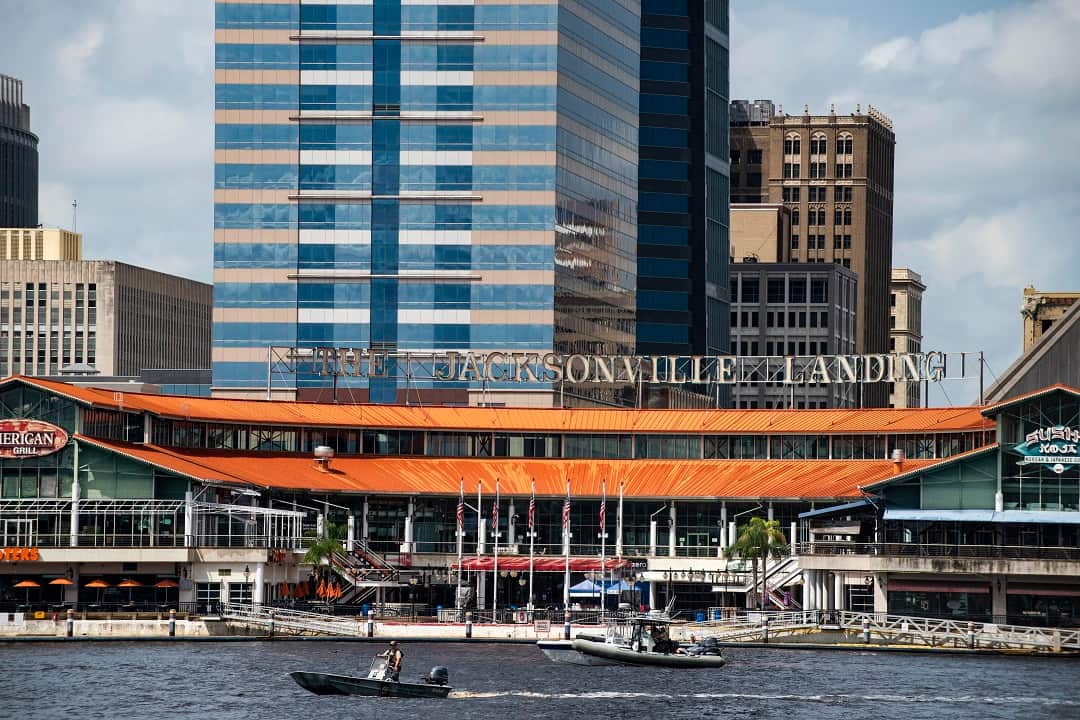 The coast guard patrols the St John's river outside of the Jacksonville Landing in Jacksonville.