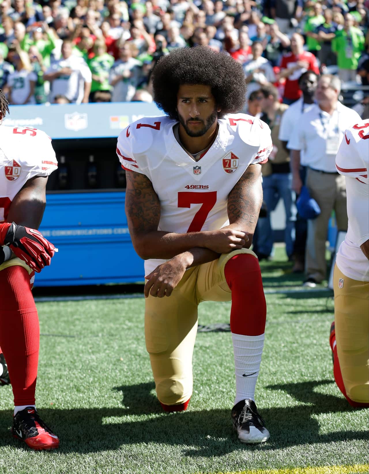 FILE - In this Sept. 25, 2016, file photo, San Francisco 49ers' Colin Kaepernick kneels during the national anthem before an NFL football game