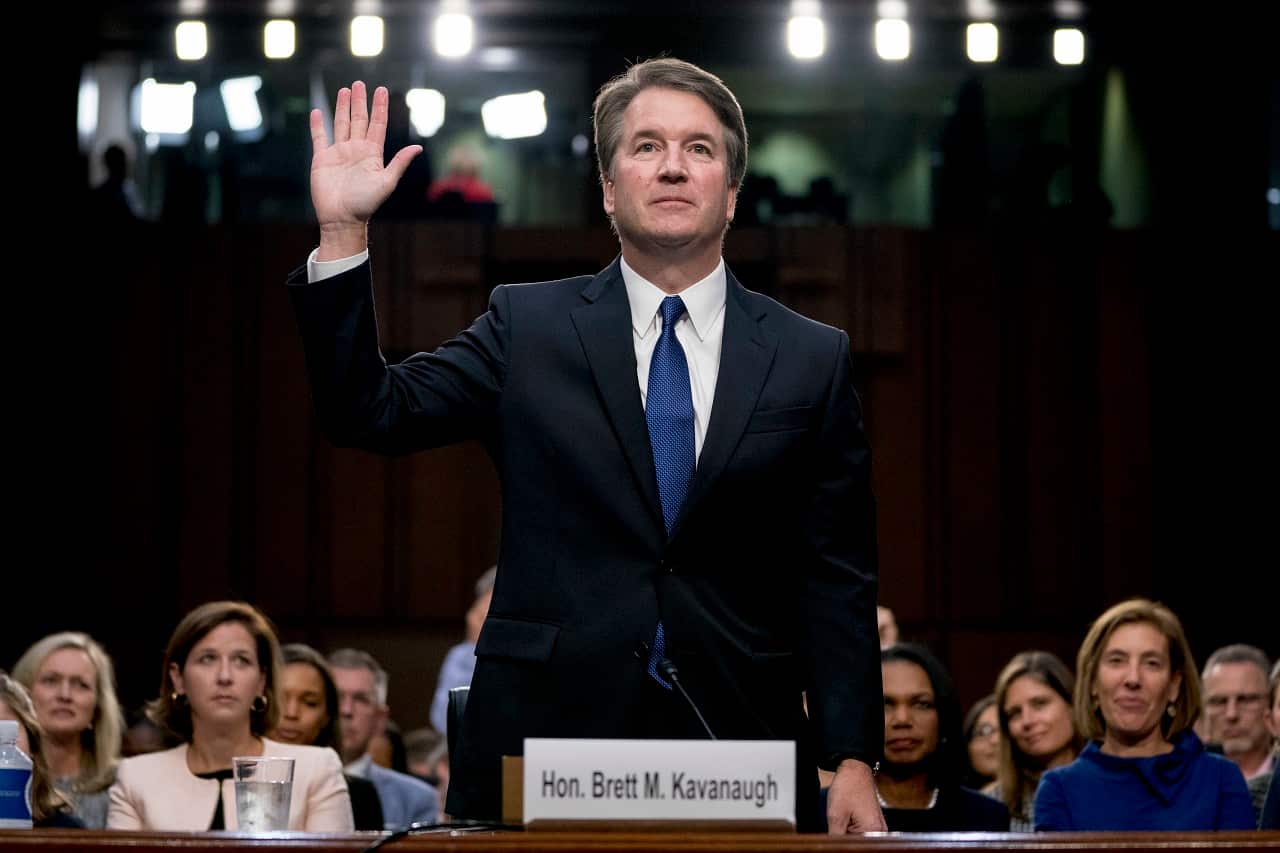 Brett Kavanaugh is sworn-in before the Senate Judiciary Committee on Tuesday.