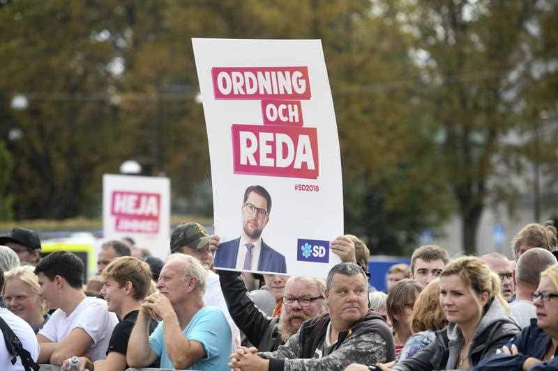 Crowds support Jimmie Akesson, leader of the right wing party Sverigedemokraterna.