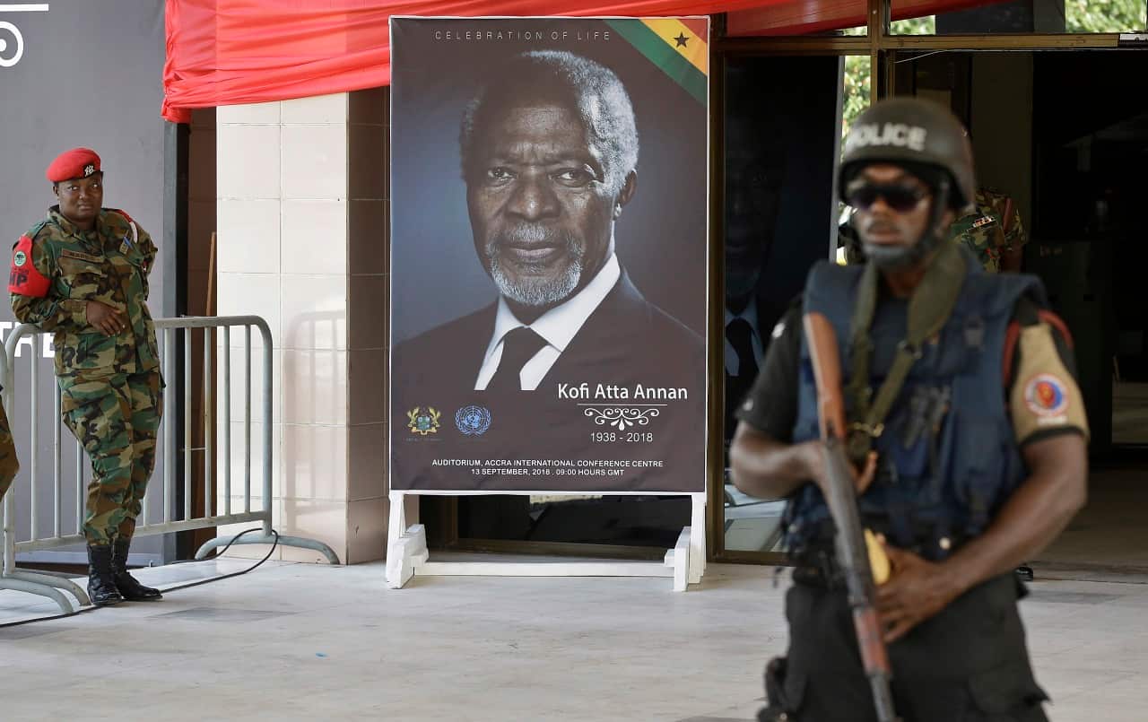 A police officer stands guard at the Accra International Conference Center where Annan's body was laying in state.