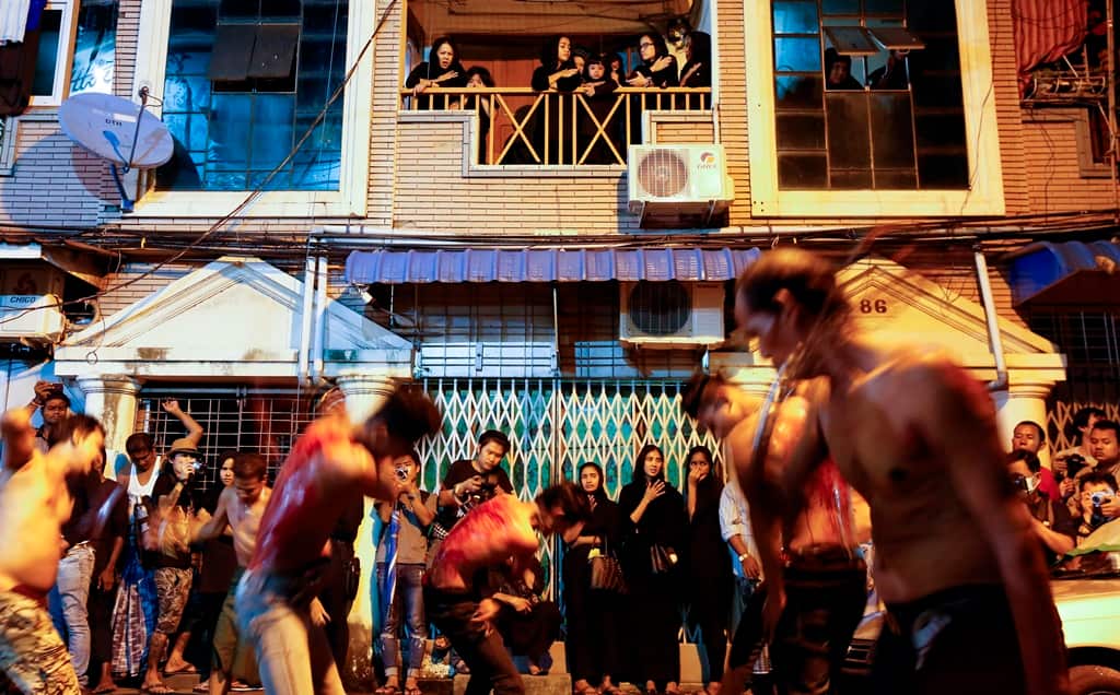 Myanmar Shia Muslims flagellate themselves as they take part Ashura Day procession in Yangon, Myanmar,