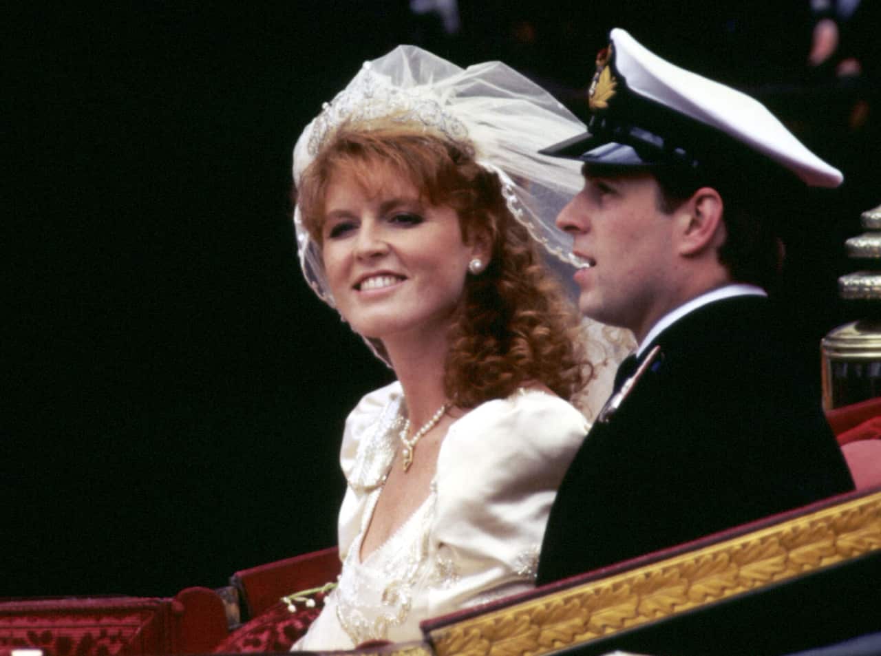 The Duke and Duchess of York smile happily after their wedding at Westminster Abbey in London.