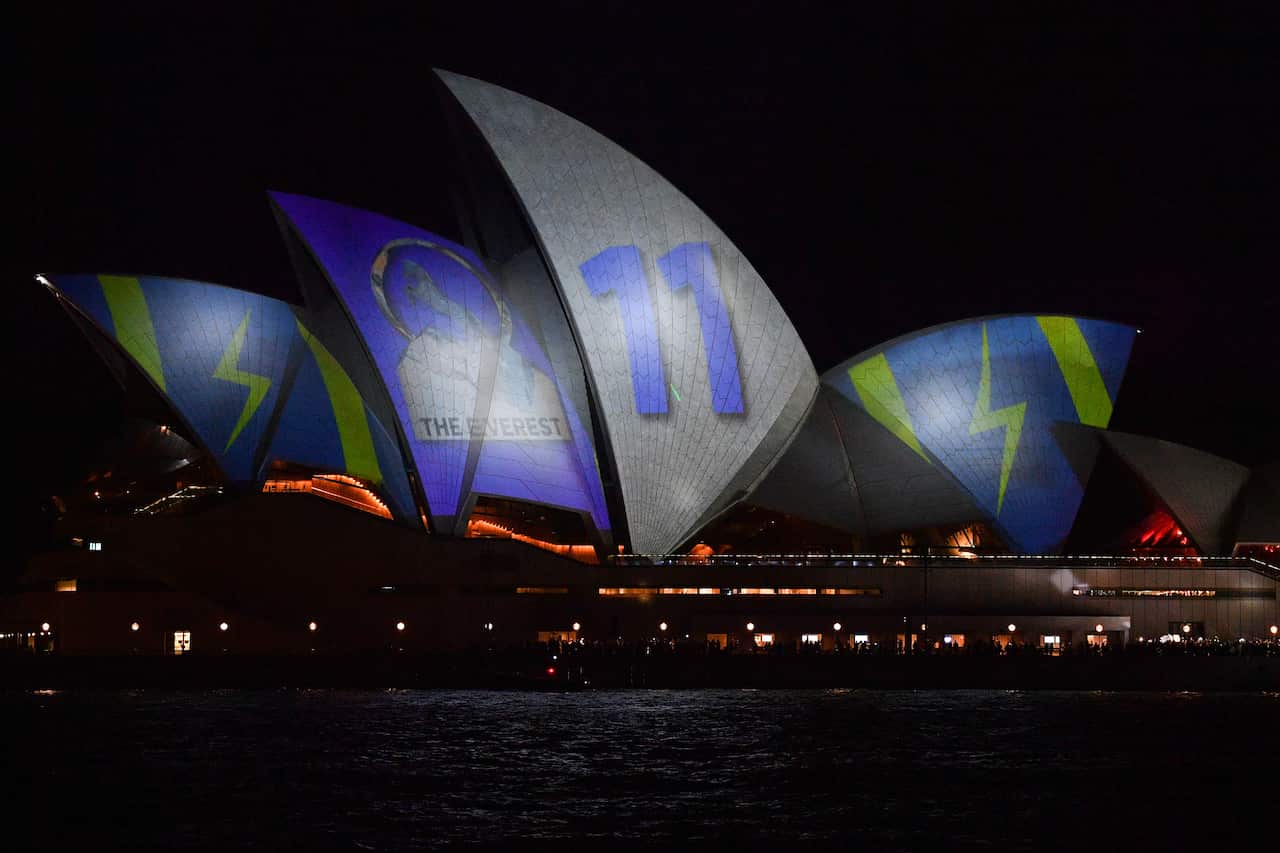 Prostesters armed with torches interrupted the barrier draw projection on the Sydney Opera House.