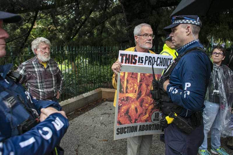 Protestor Graham Preston is seen during the March together for Choice rally in Brisbane, ahead of proposed changes to Queensland's abortion laws.