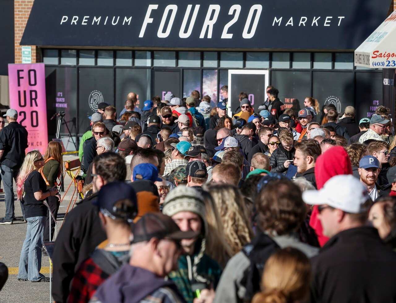 People line up to purchase legal cannabis in Calgary, Alberta.