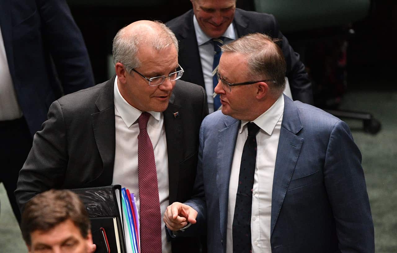 Scott Morrison and Anthony Albanese leave after Question Time.