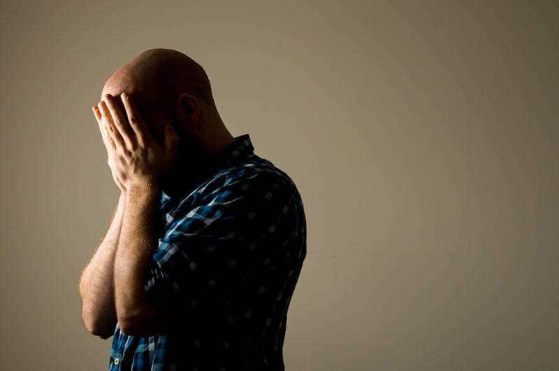 ile photo dated 09/03/15 of a person showing signs of depression.