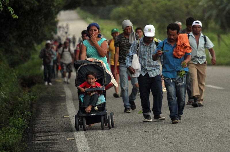 The caravan of Honduran migrants in Mapastepec, Mexico, 25 October 2018, heading towards the municipality of Pijijiapan during its journey through Mexico to the USA.