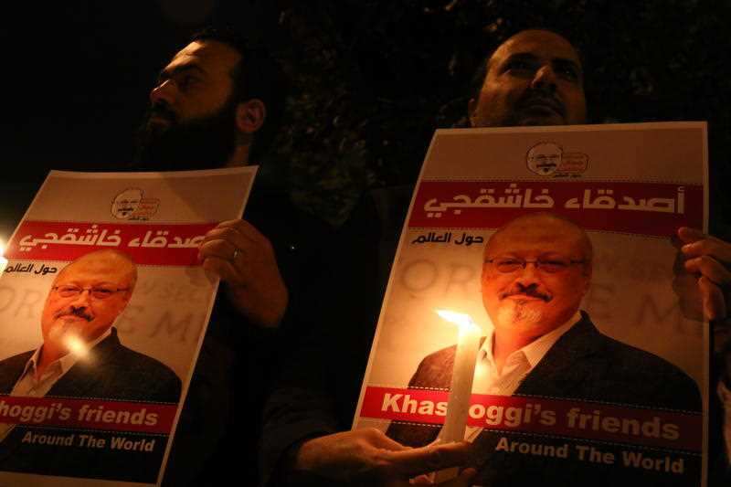 Activists, protesting the killing of Saudi journalist Jamal Khashoggi, hold a candlelight vigil outside Saudi Arabia's consulate in Istanbul, Turkey, Thursday October 25, 2018. 