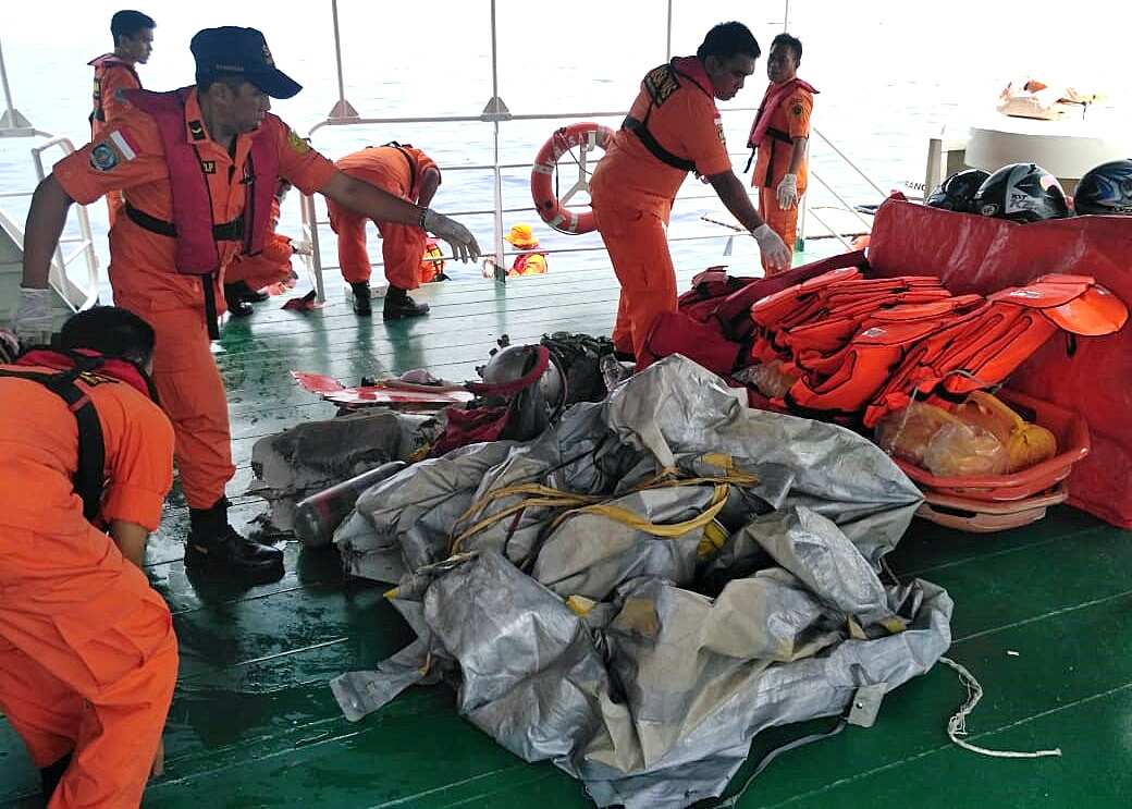 Indonesian rescuers evacuating parts from a crashed Lion Air passenger plane in waters off Tanjung Karawang, West Java.