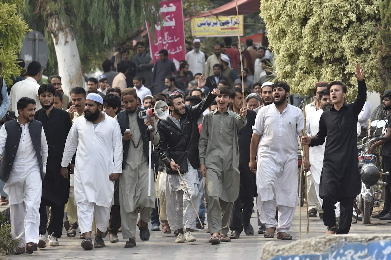 Protesters shout slogans during a rally against Christian woman Asia Bibi, who had been sentenced to death for blasphemy.