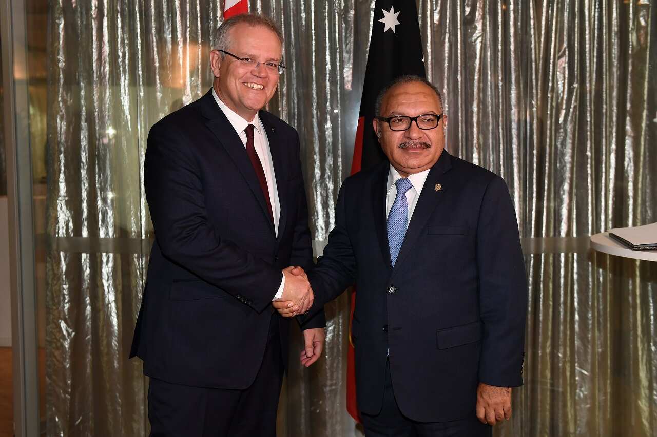 Prime Minister Scott Morrison greets Prime Minister of Papua New Guinea Peter O'Neill on Thursday.