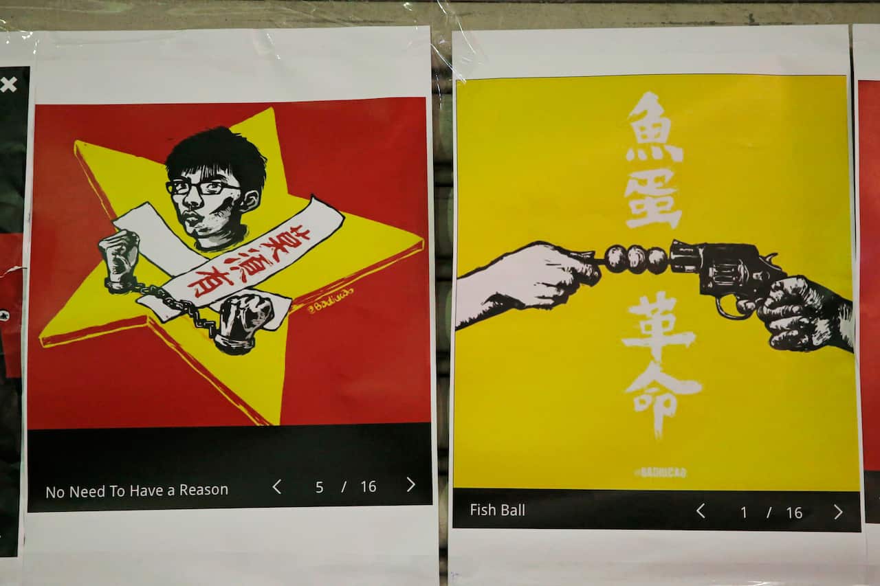 The copies of the Badiucao's political artworks are displayed at a bookstore after the cancellation of his exhibition in Hong Kong.