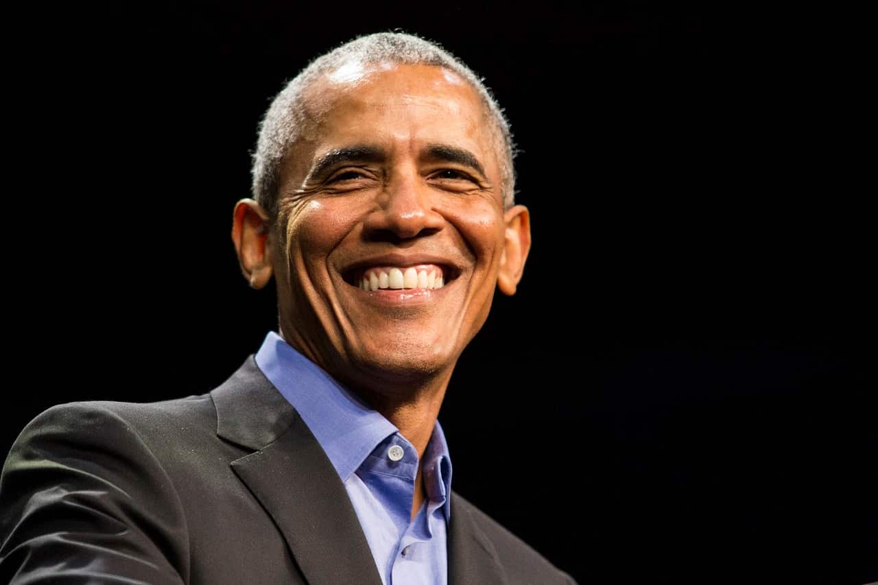 Former President Barack Obama smiles during a Get Out The Vote rally.