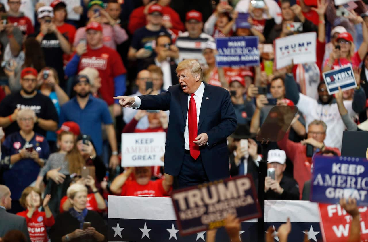 US President Donald Trump speaks to supporters during a rally in Cleveland.