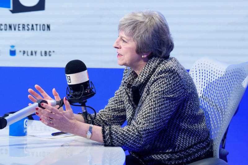 Prime Minister Theresa May pictured during a live phone-in on LBC, hosted by presenter Nick Ferrari, at their studios in central London.