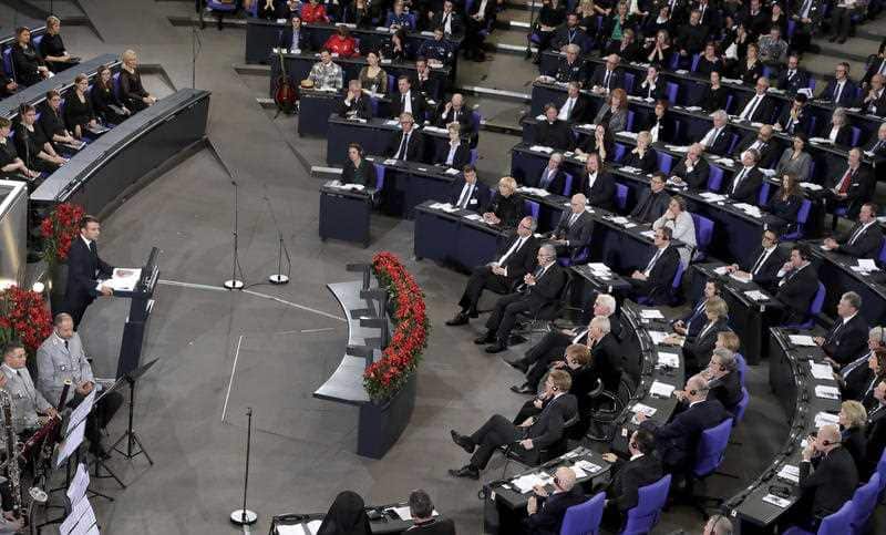 France's President Emmanuel Macron delivers a speech during a meeting of the German Federal Parliament