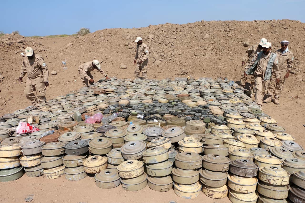 Explosives experts collect mines and explosives allegedly planted by Houthi rebels in Yemen.