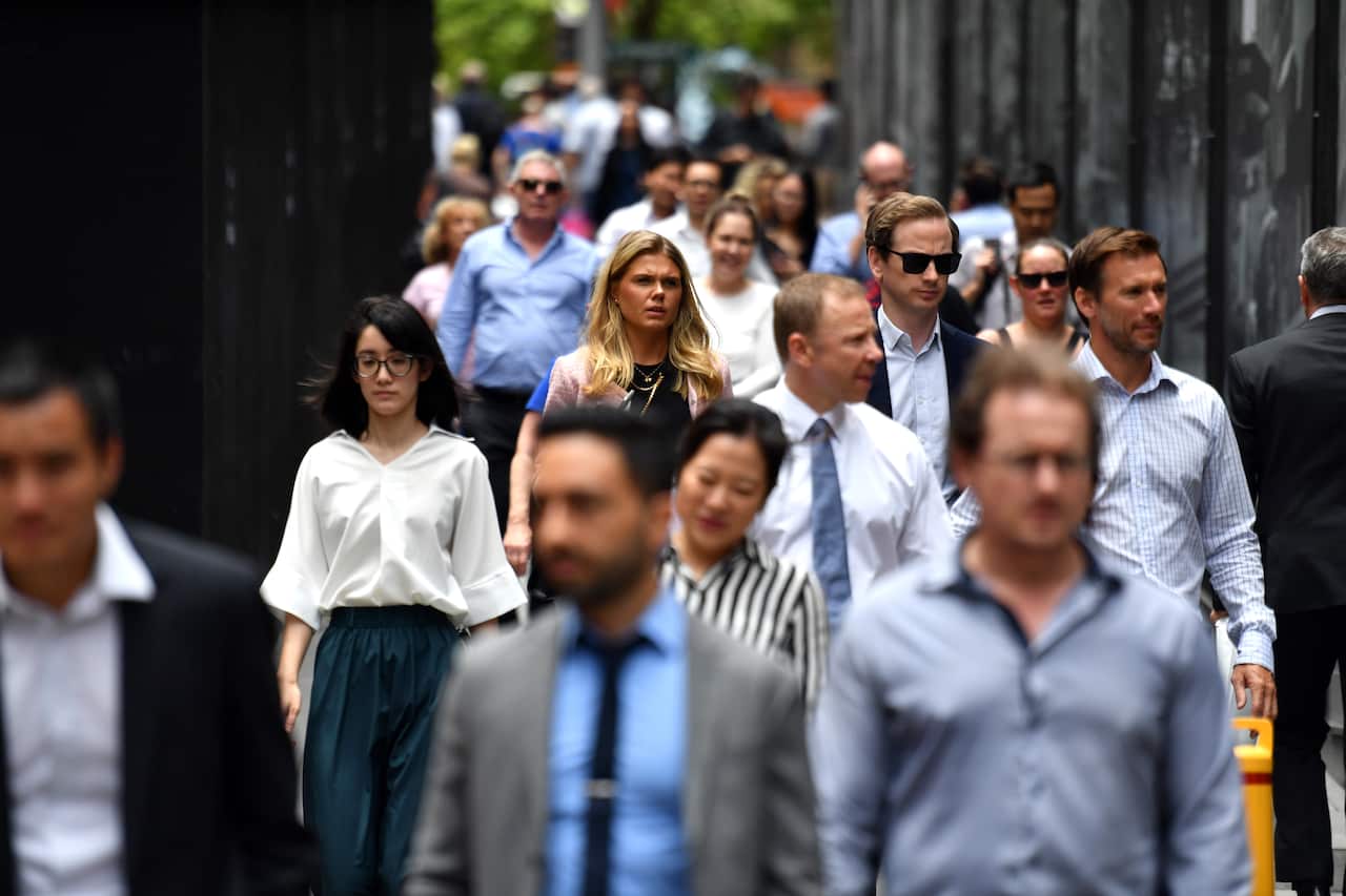 Office workers are seen at lunch break at Martin Place in Sydney, Wednesday, December 12, 2018. (AAP Image/Mick Tsikas) NO ARCHIVING