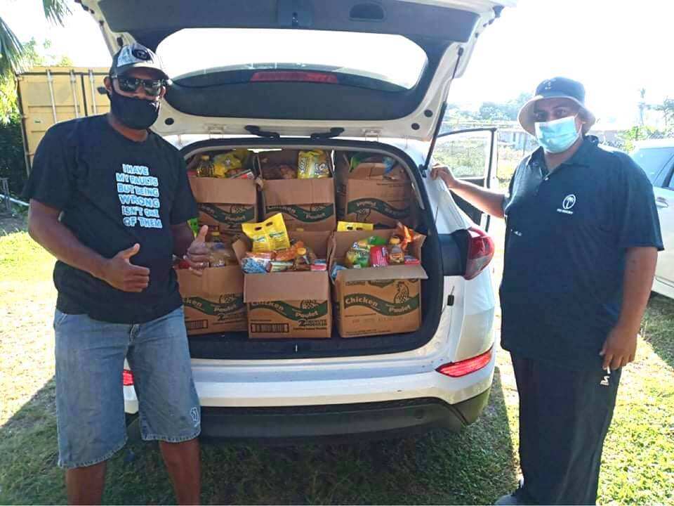 Ambassadors for the Australian Integrated Fijian Association of Victoria delivering essential items to families in Fiji.