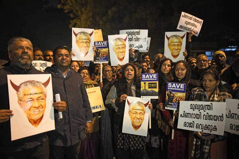 Ayyappa devotees protesting against the entry of two women inside the Sabarimala temple of Lord Ayyappa.
