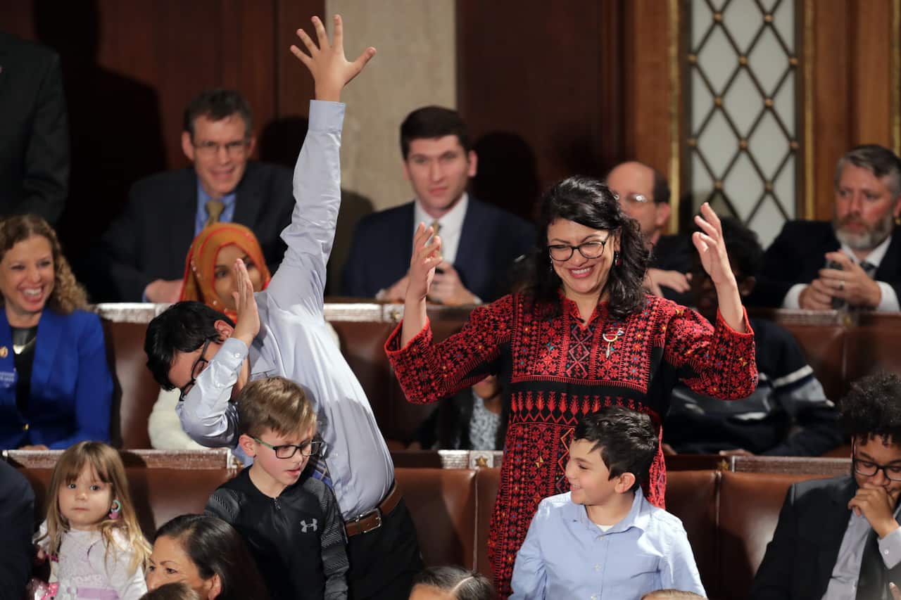 Rashida Tlaib votes for Speaker-designate Nancy Pelosi along with her kids during the first session of the 116th Congress.