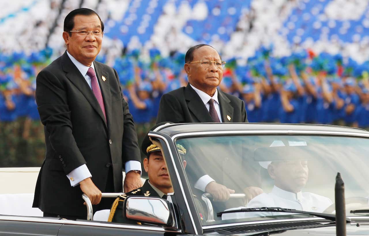 Cambodian Prime Minister Hun Sen (L), and President of the National Assembly Heng Samrin (R).