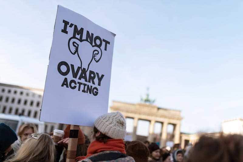 Women march outside Brandenberg Gate during the 2019 Women's March in Berlin, Germany.
