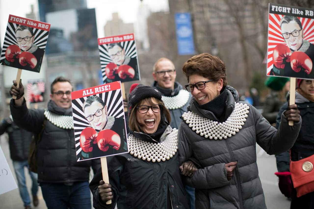 Supporters of Justice Ruth Bader Ginsburg march during the 2019 Women's March Alliance in New York. 