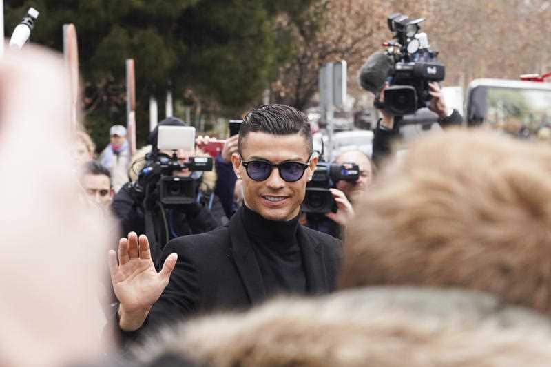 Cristiano Ronaldo leaves after attending a court hearing for tax evasion in Madrid on January 22, 2019
