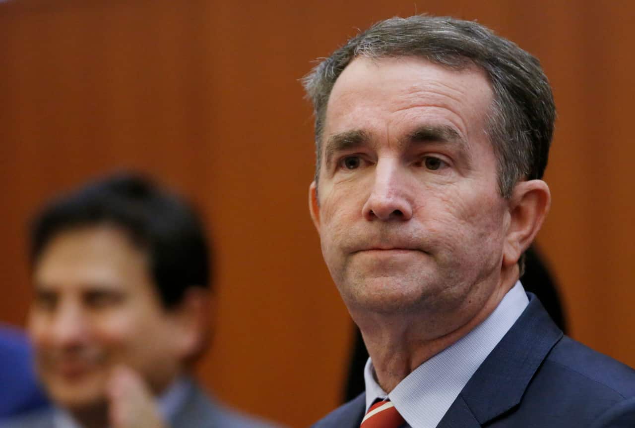 Virginia Gov Ralph Northam has apologised for appearing in a Ku Klux Klan outfit in his 1983 yearbook. 
