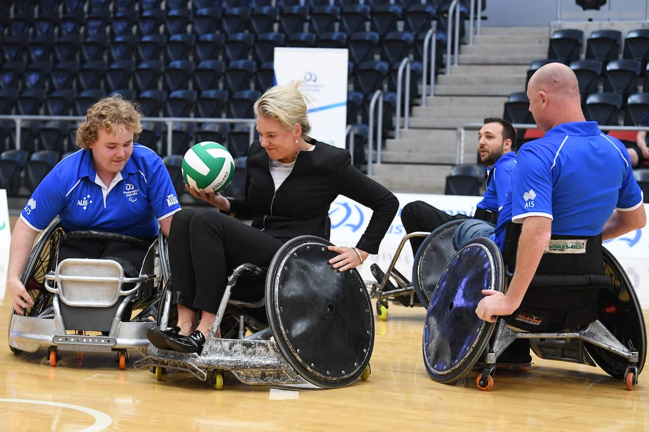 Senator Bridget McKenzie plays a game of Wheelchair Rugby with Paralympic athletes.