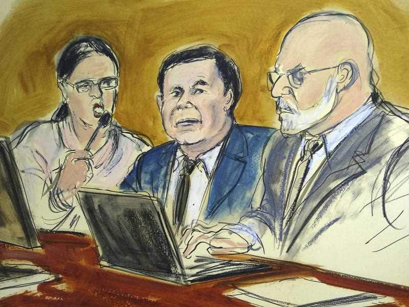 In this courtroom drawing, Joaquin "El Chapo" Guzman, center, sits at the defense table.