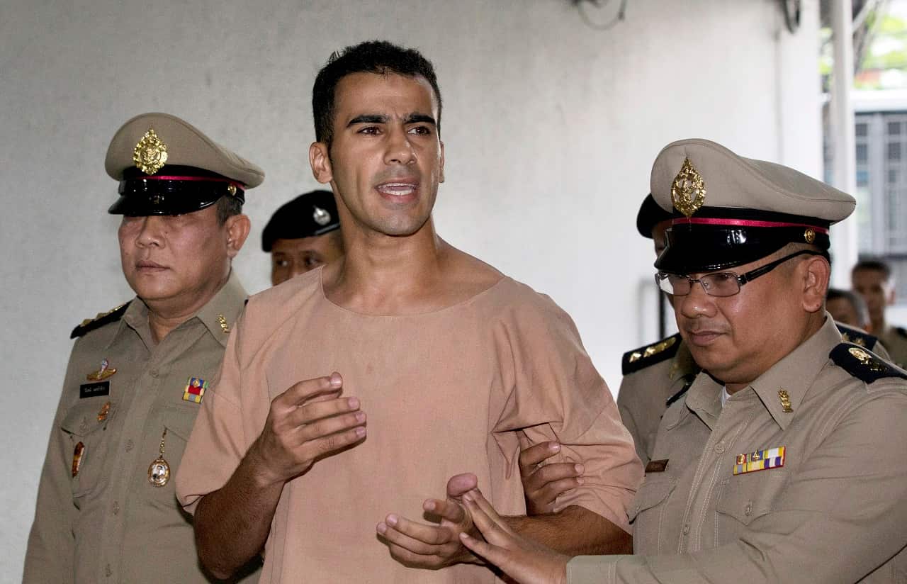 Detained Bahraini soccer player Hakeem al-Araibi arrives at the criminal court in Bangkok, Thailand.