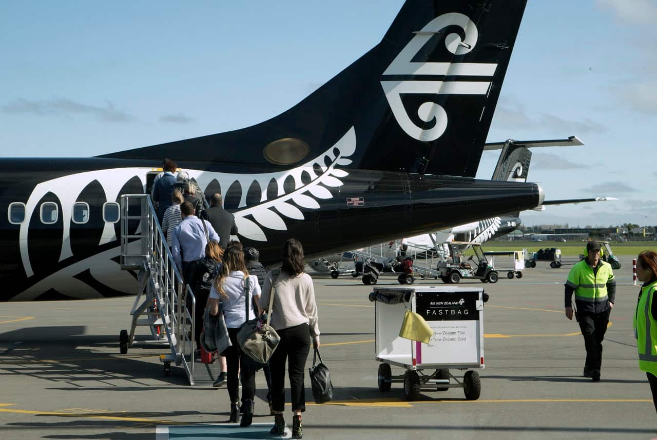 Passengers board an Air New Zealand flight at Christchurch Airport.