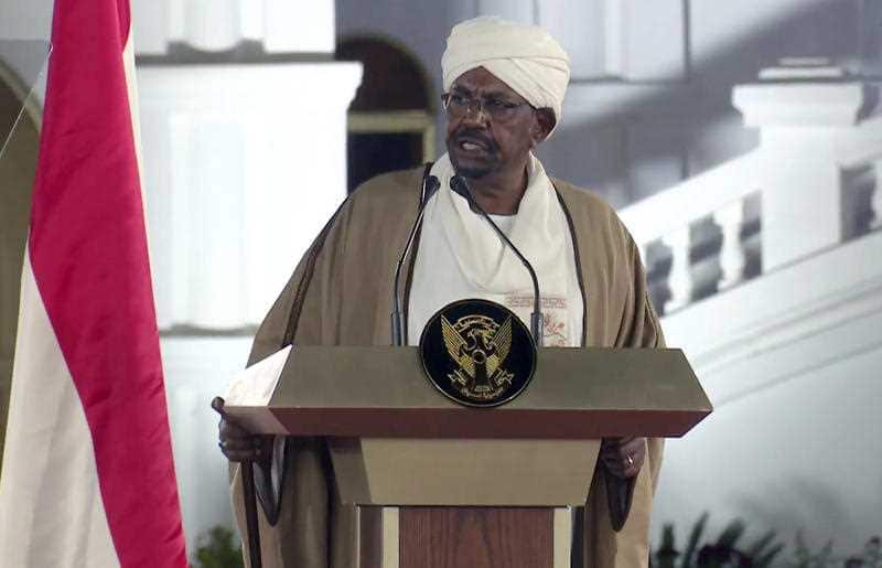 Sudan's President Omar al-Bashir speaks at the Presidential Palace, Friday, Feb. 22, 2019
