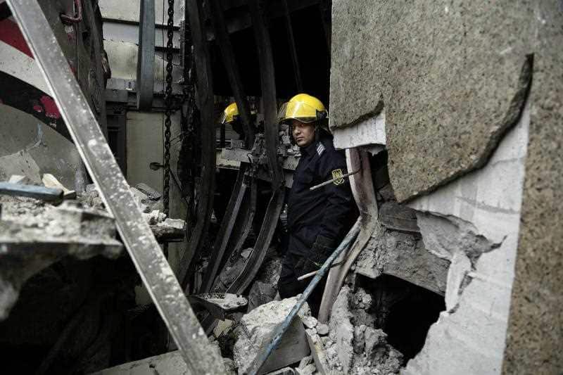 Firefighters work at the scene.