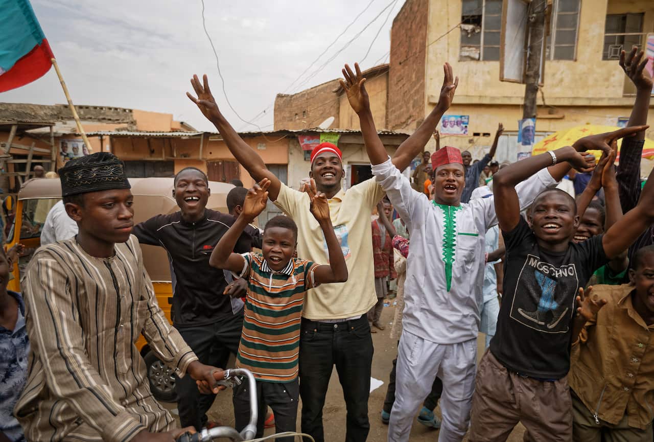 Supporters of Nigeria's President Muhammadu Buhari celebrate his electoral win in the streets of Kano, northern Nigeria.