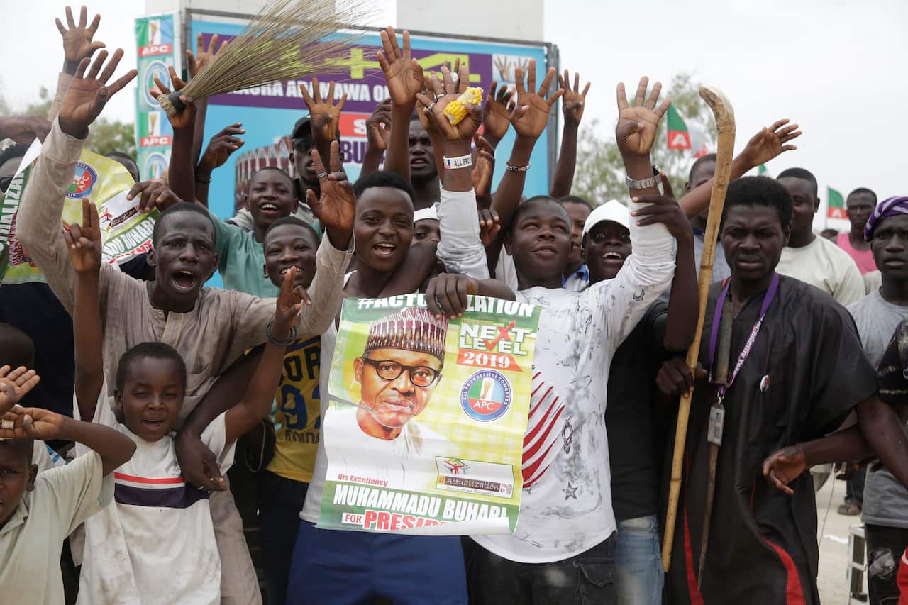 Supporters of Nigeria's President Muhammadu Buhari celebrate his electoral win in the streets of Yola, northern Nigeria.